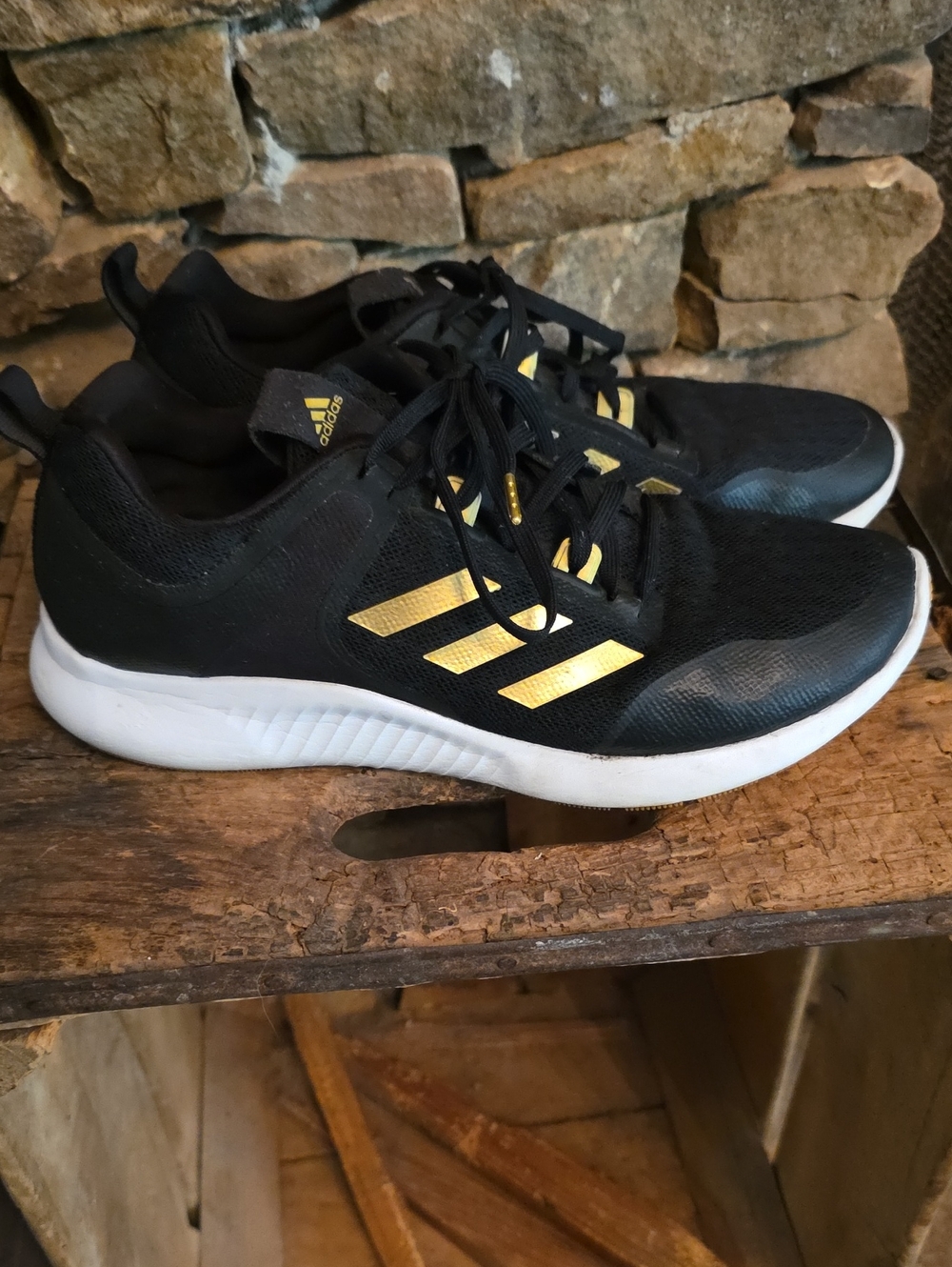 adidas Black and Gold Mesh Athletic Sneakers